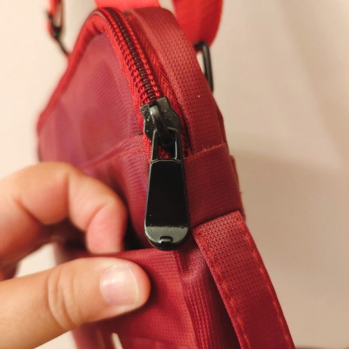 Waterproof red shoulder and hand bag for tablet