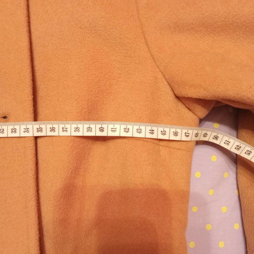 Beige coat with burgundy size medium like new