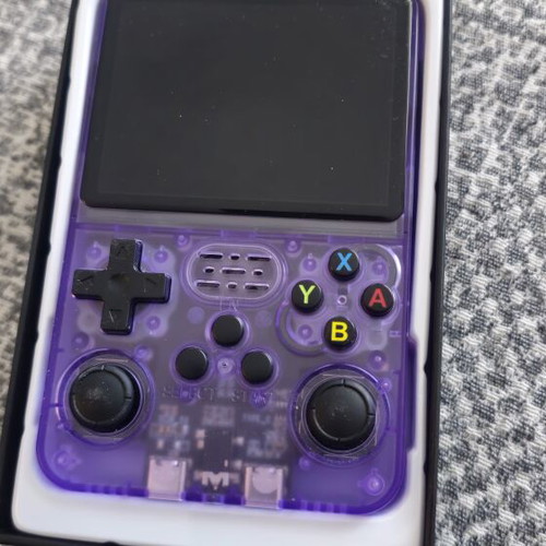 R36S handheld console like new with thousands of games