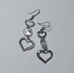 Earrings used with beads and heart shape