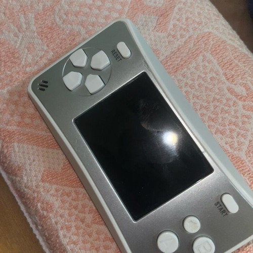 Retro handheld electronic game like new, 4 game types