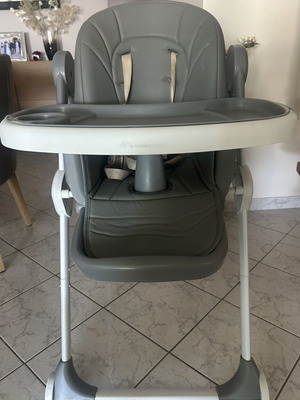Bebeconfort high chair used with wheels and adjustable features