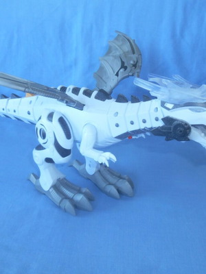 Electronic robotic Dinosaur toy used with sound and light