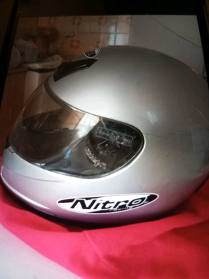 Helmet used with red fabric case in excellent condition