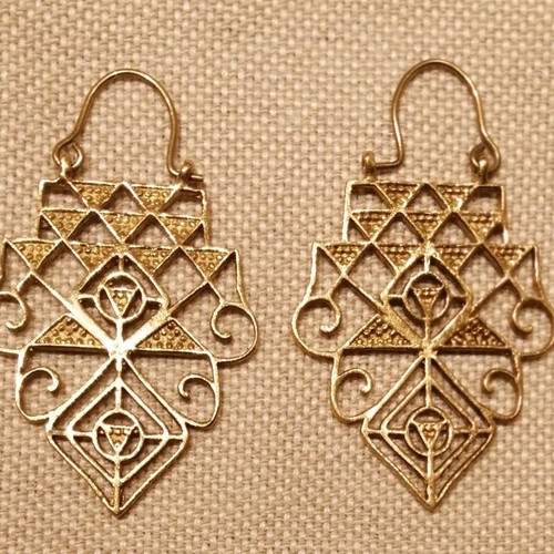 Earrings in archaic style