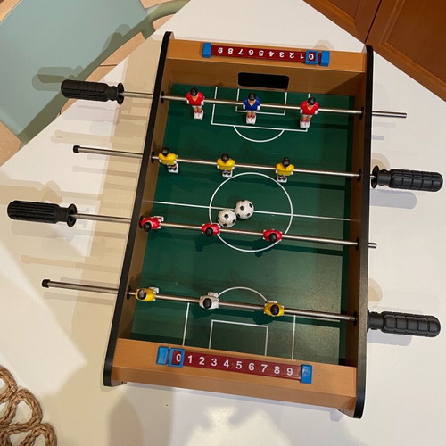 Foosball table used with two balls in excellent condition