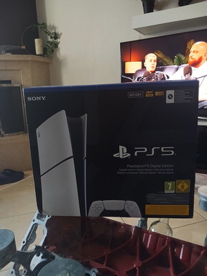 PlayStation 5 Digital Edition 1TB like new with controller, cables, and game