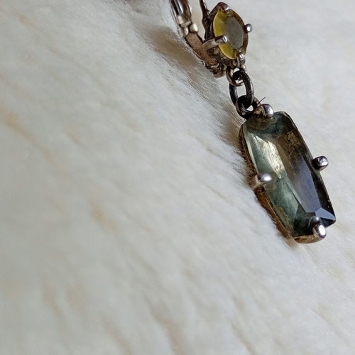 Silver earring with pale green stones, used, 100-year-old heirloom