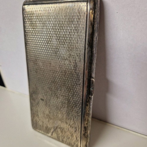 Cigarette case used, silver with slight wear