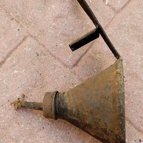 Vintage wall-hanging oil lamp used, rustic decoration