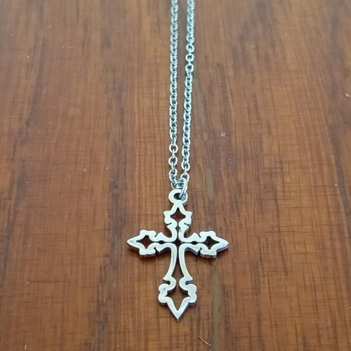 Steel cross like new, silver color