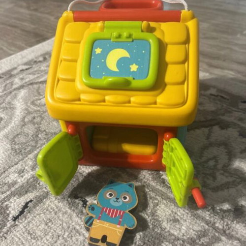 Educational Mobility Toy like new with wooden cat
