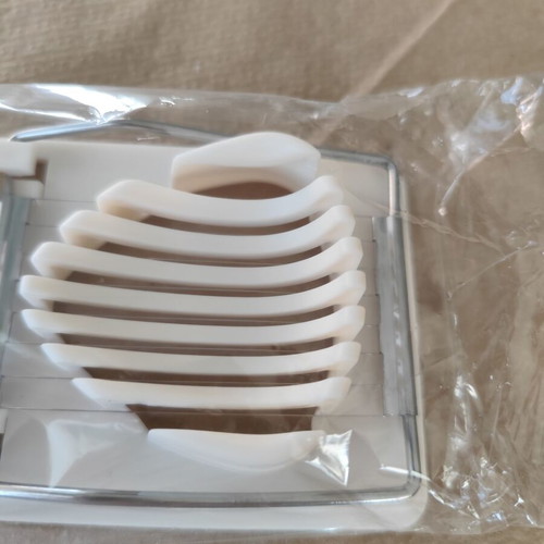 Multifunctional egg cutter new in packaging