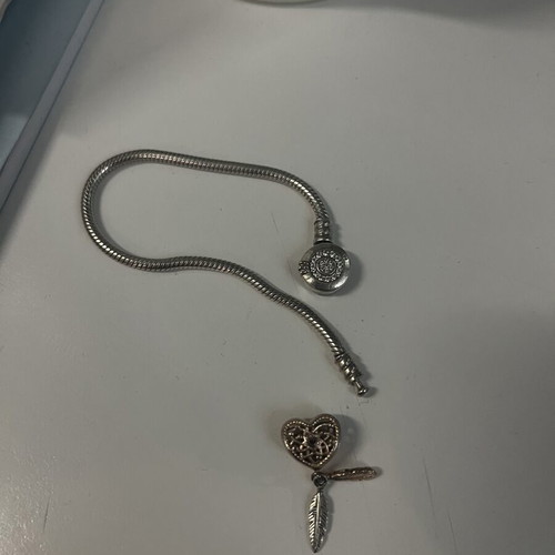 Pandora bracelet 17cm like new with charm, clasp repair needed