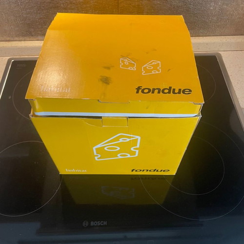 Fondue set used with 6 forks