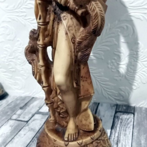 Decorative tabletop statue of Asian man like new