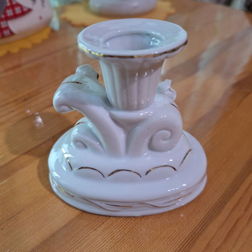 Porcelain candlestick with gilded elements like new