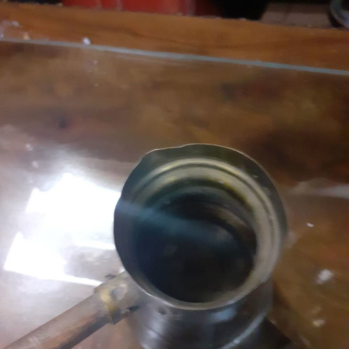 Electric brass briki used with wooden handle
