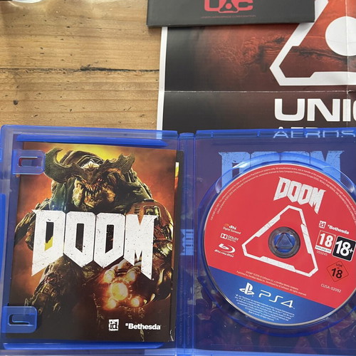 Doom PS4 deluxe edition with UAC pack, like new