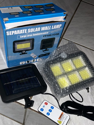 Ηλιακή λάμπα με αισθητήρα κίνησης και διαχωρισμένο ηλιακό πάνελ καινούργια