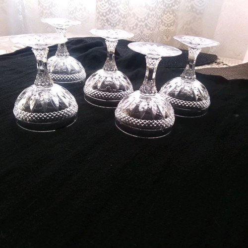 Liqueur glasses used, 4 handmade painted and 5 carved crystal