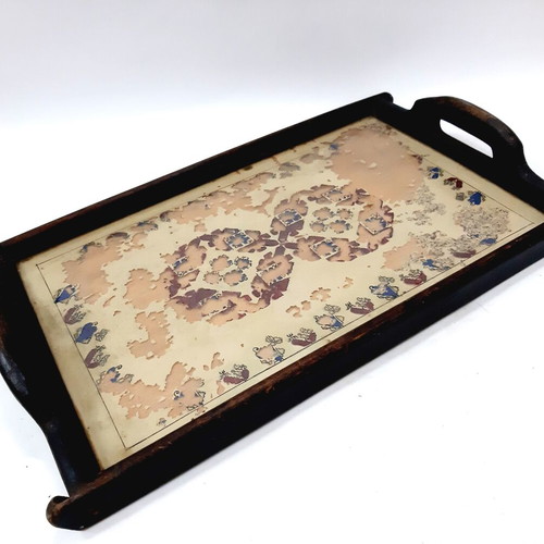 Vintage wooden tray with glass panel and painted design used