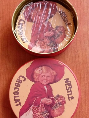 Collectible set of six metal Nestle Chocolate coasters new, sealed
