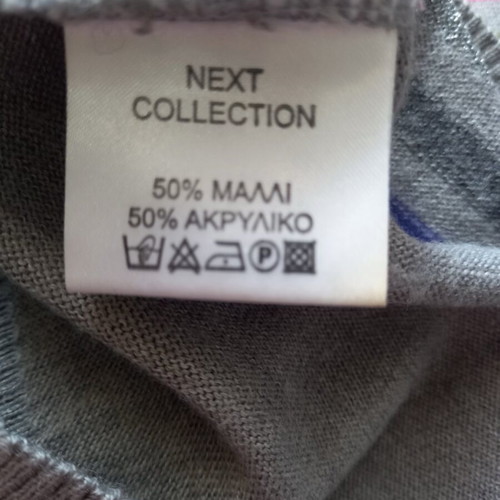 Women's knitted striped sweater like new, gray base with colorful stripes