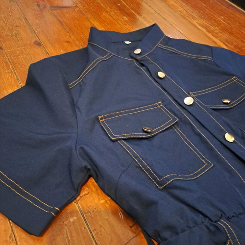 Jumpsuit like new, dark blue with gold buttons and brown stitching