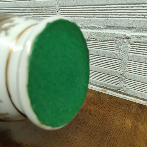 Old porcelain vase used, hand-painted with romantic scene