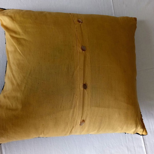 Vintage decorative sofa pillow with handmade embroidery and buttons used