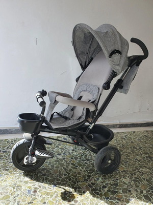 Kinderkraft AVEO children's tricycle used with handle