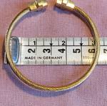 Stainless steel bracelet used, gold color with cross design