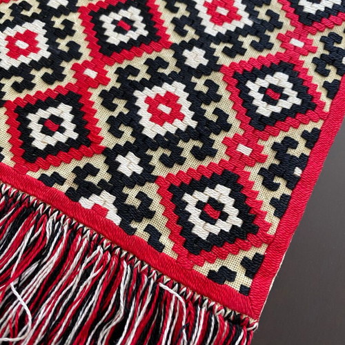 Set of 2 handmade woven decorative textiles with geometric pattern
