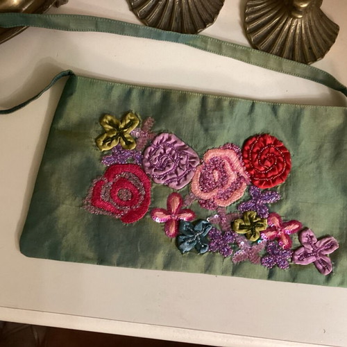 Evening bag satin texture with embossed embroidery like new, multicolor green