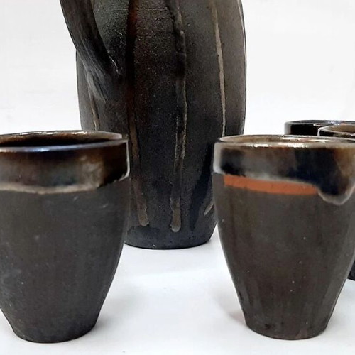 Vintage ceramic alcohol set with jug and 5 cups used