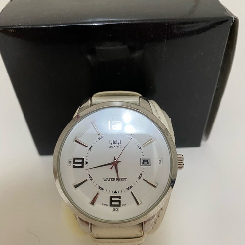 Quartz watch used, beige, needs strap replacement