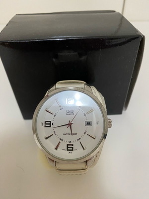 Quartz watch used, beige, needs strap replacement