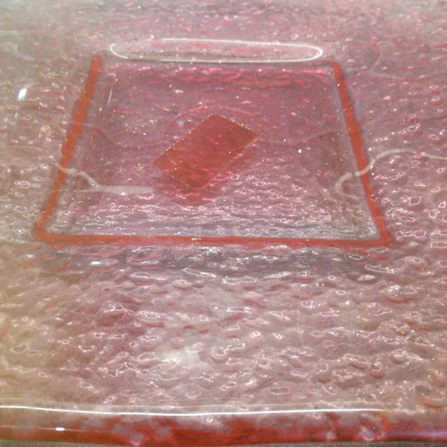 Pink serving platter used, square with embossed design