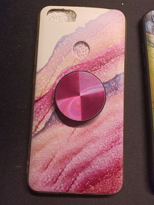 Case and pop socket for Redmi Note 5A lightly used with small cut on camera