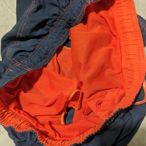 Calvin Klein men's swim shorts like new, blue with orange details, size L