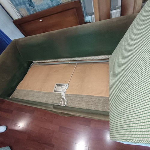 Two-seater sofa bed used