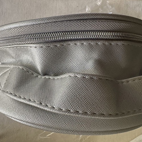 Avon toiletry bag new, silver