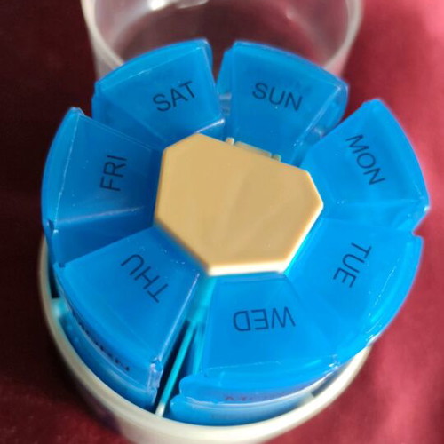 Rotating plastic weekly pill organizer new medication storage device