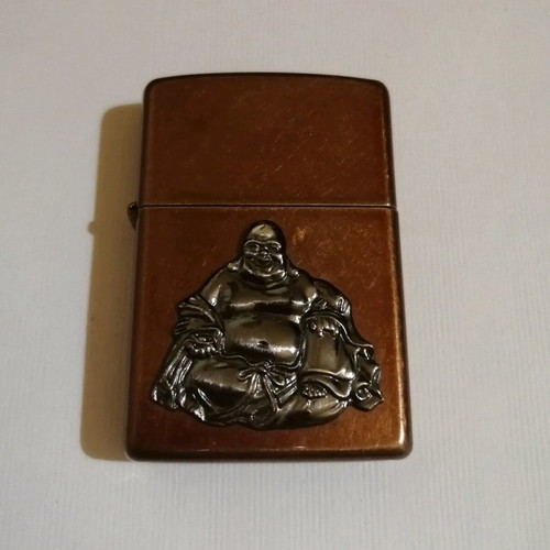 Zippo lighter used, bronze with applique Buddha design