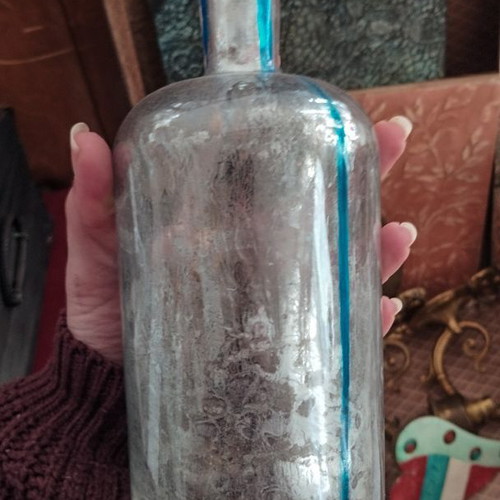 Glass bottle restored like new for decoration