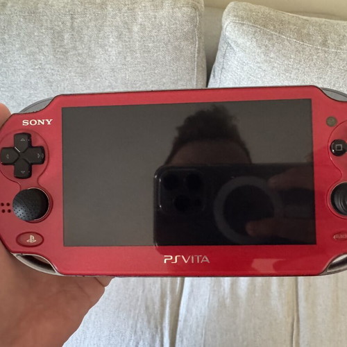 Sony PlayStation Vita 1000 like new with OLED screen and 128GB SD card