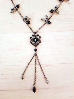 Women's chain necklace with black stones and zircon