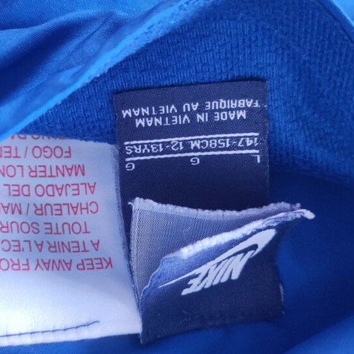 Nike lightweight double face jacket used with pocket damage