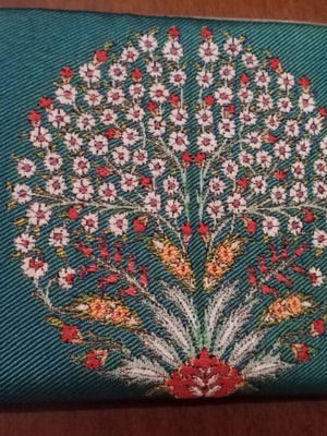 Handmade silk clutch bag with embroidery and soft leather interior